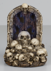 Resin figurine. Skulls-door